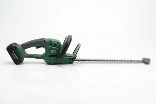 Cordless hedge trimmer, green body with black battery and dual-hand grip
